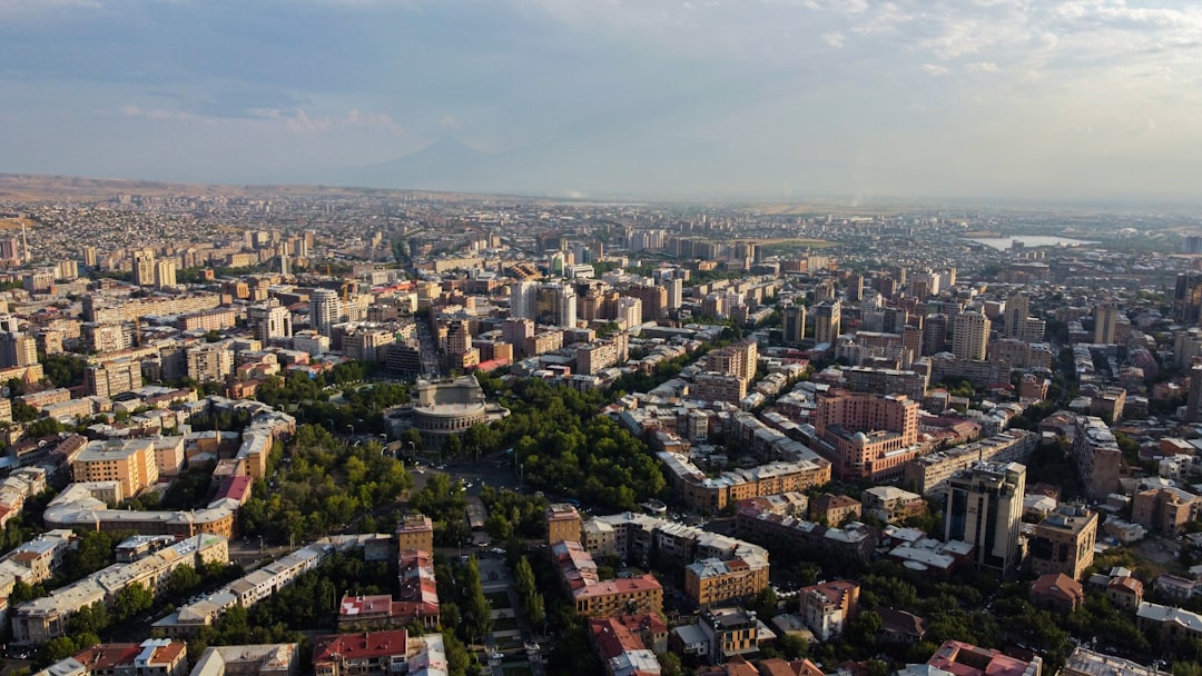 Aerial view of a sprawling city with many buildings.